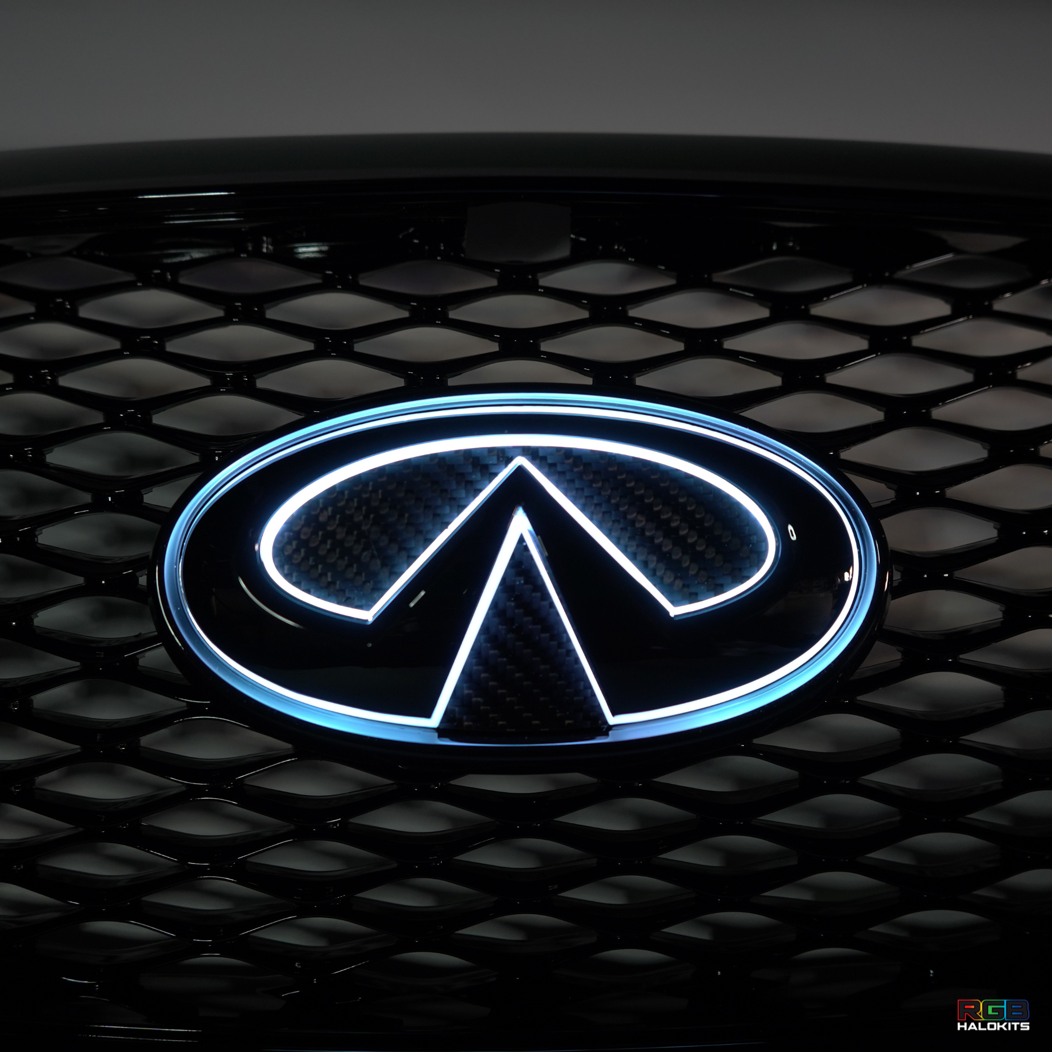 Infiniti Q60 RGB LED Emblem (2014-2022) – Custom Multicolor LED Lighting by RGB Halo Kits