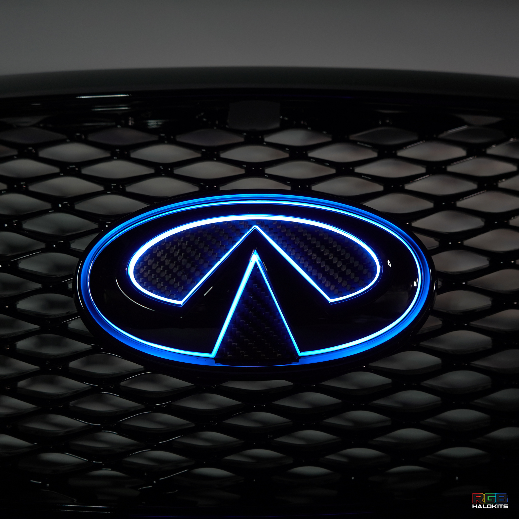 Infiniti Q60 RGB LED Emblem (2014-2022) – Custom Multicolor LED Lighting by RGB Halo Kits