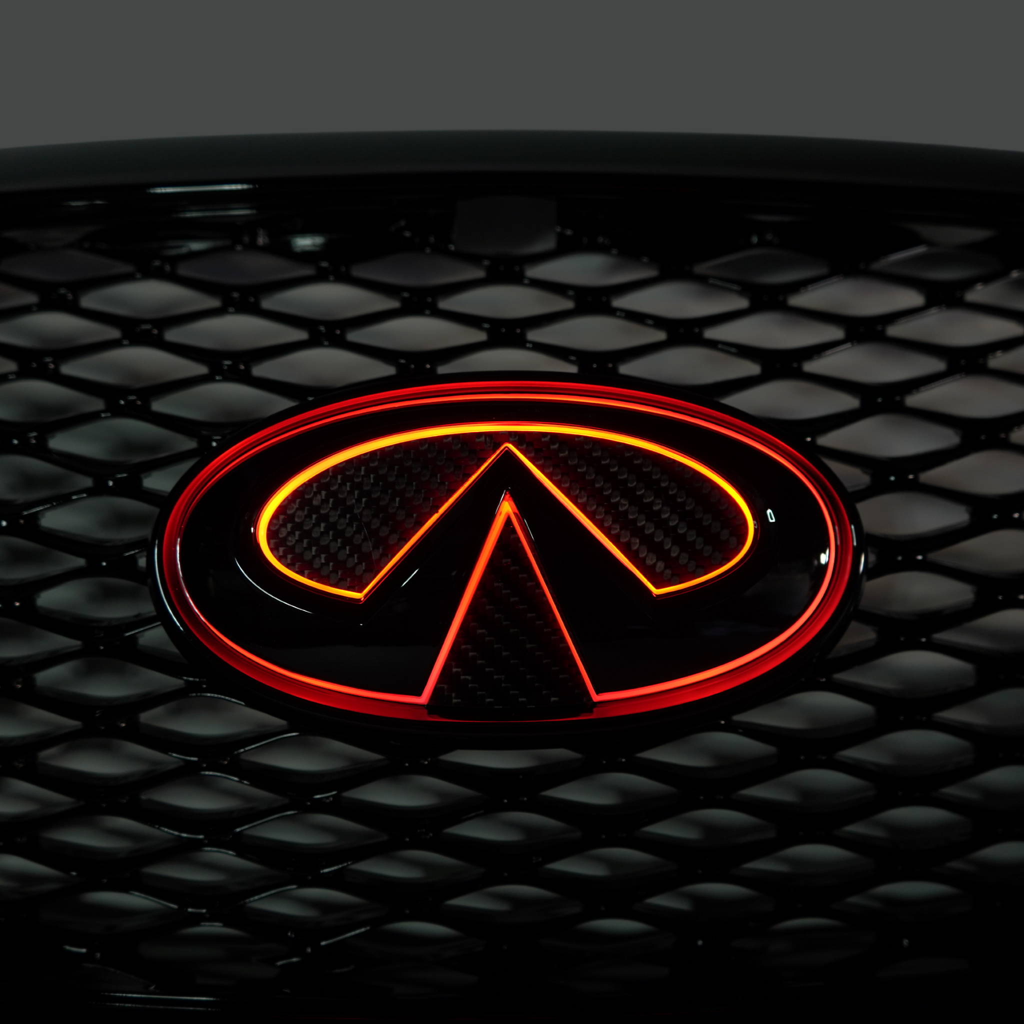 Infiniti Q60 RGB LED Emblem (2014-2022) – Custom Multicolor LED Lighting by RGB Halo Kits