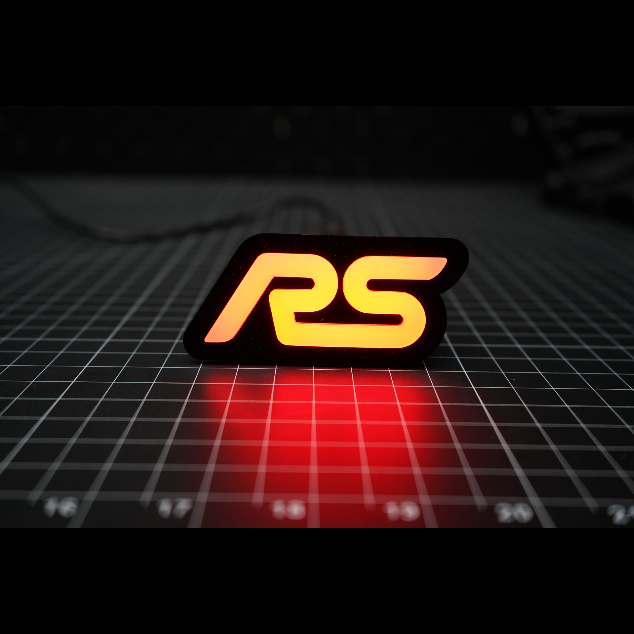 RS : Multicolor Flow LED Badge (15-18 Ford Focus) | Lit Logos – Custom Multicolor LED Lighting by RGB Halo Kits