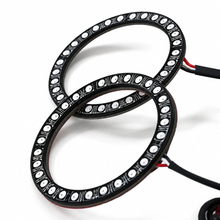 Two unlit LED halo rings shown at an angle on a white surface