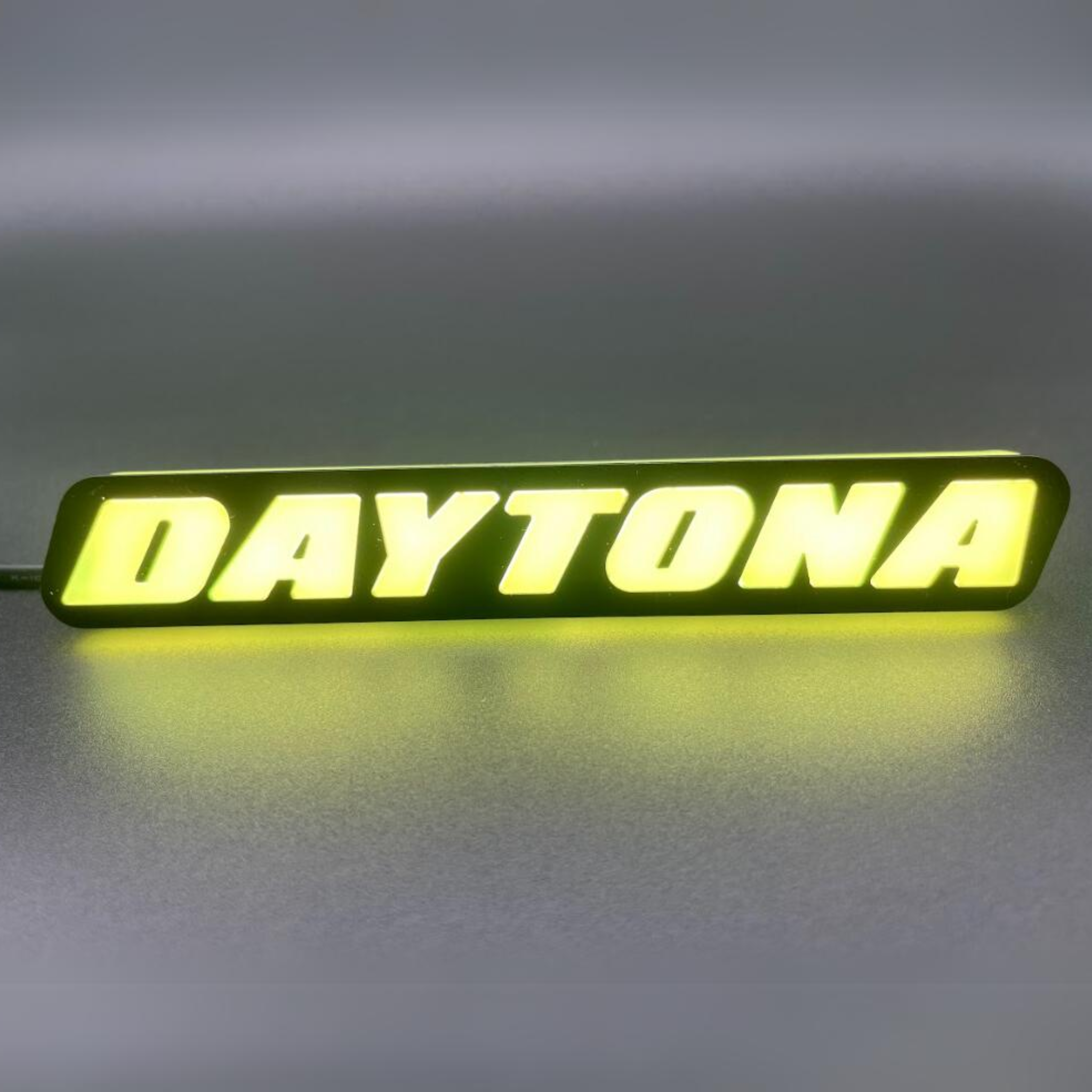 Daytona LED Badge: (Multicolor)