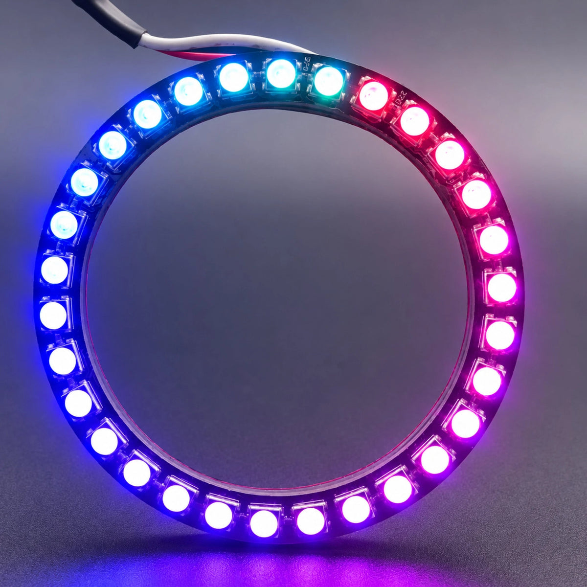 LED halo ring displaying blue, cyan and magenta lighting