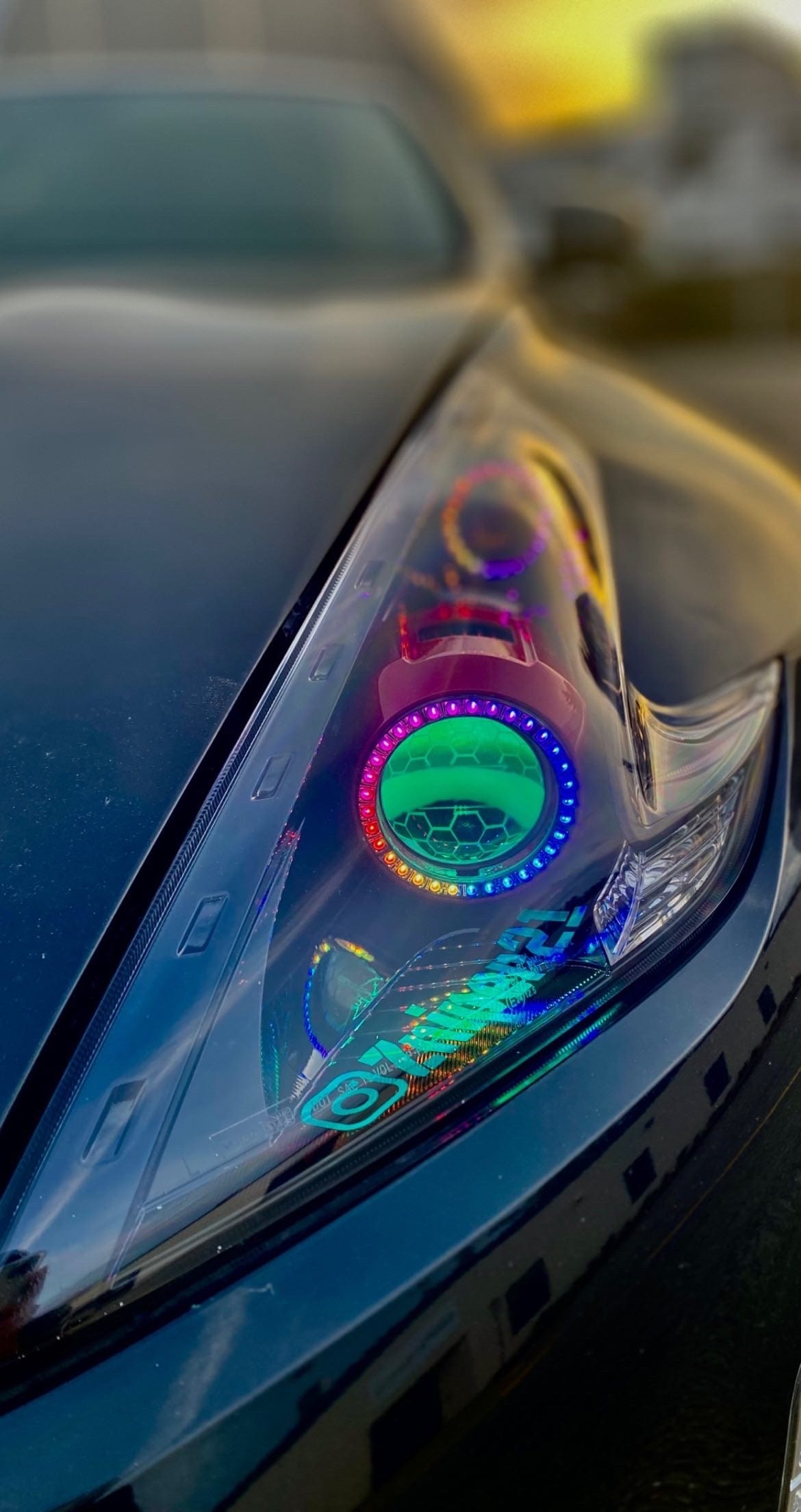2009-2017 Nissan 370Z Multicolor Halo Kit - RGB Halo Kits Multicolor Flow Series Color Chasing RGBWA LED headlight kit Oracle Lighting Trendz OneUpLighting Morimoto theretrofitsource AutoLEDTech Diode Dynamics